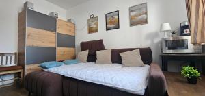 Postel nebo postele na pokoji v ubytování Apartmán U Bejka