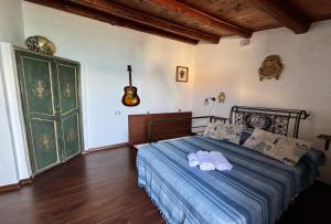A bed or beds in a room at Terrazza del Mare (by Vacation Service)