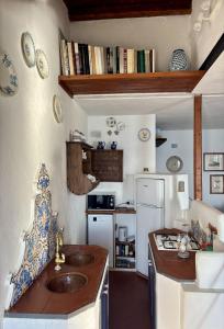 A kitchen or kitchenette at Terrazza del Mare (by Vacation Service)