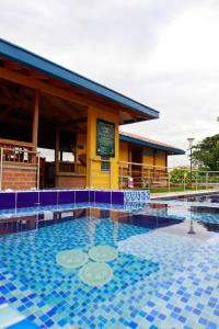 Bazén v ubytování Ecohotel Guaduales Nature nebo v jeho okolí