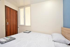 Letto o letti in una camera di P&A guest house