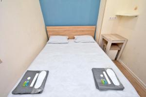 Letto o letti in una camera di P&A guest house