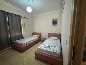 Ένα ή περισσότερα κρεβάτια σε δωμάτιο στο Luxury apartments