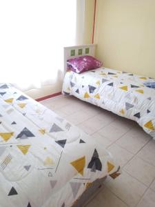 Ένα ή περισσότερα κρεβάτια σε δωμάτιο στο Cely cabañas