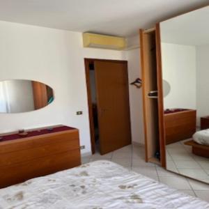 Postel nebo postele na pokoji v ubytování Argentario bed and beach