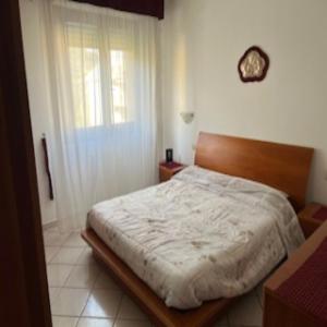 Postel nebo postele na pokoji v ubytování Argentario bed and beach + 28 fotografií