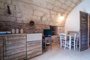 Kuchyň nebo kuchyňský kout v ubytování Agriturismo Le Fornelle