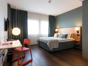 Letto o letti in una camera di Quality Hotel Globe
