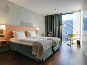 Letto o letti in una camera di Quality Hotel Globe