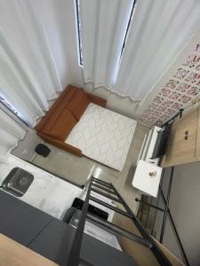 an overhead view of a small room with a bed at Brisa - Praia da Pipa in Pipa +1 photo