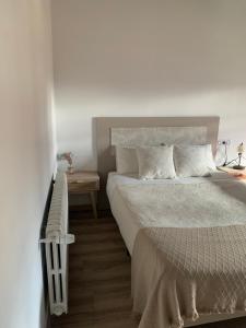 Postel nebo postele na pokoji v ubytování Casa Grande de Cristosende