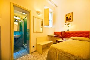 Postel nebo postele na pokoji v ubytování Residenza Sole Amalfi
