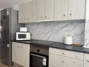 Køkken eller tekøkken på El Puertito Beach Retreat