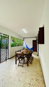 a dining room with a table and two chairs at Casa na Serra de Martins in Martins +47 photos