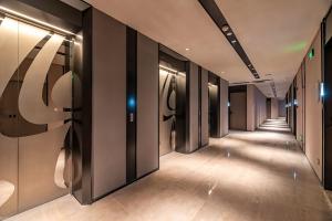 Fotografie z fotogalerie ubytování 枫雨酒店公寓华强北店-Fengyu Hotel Apartment Shenzhen Huaqiang North Subway Station Branch v destinaci Šen-čen + 13 fotografií