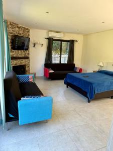 Postel nebo postele na pokoji v ubytování Ohana Punta Ballena cero nueve seis cuatro dieciocho quinientos ochenta y uno