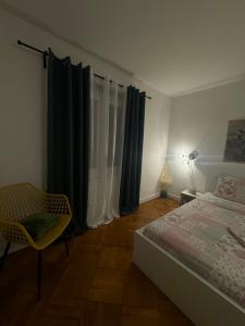 Uma cama ou camas num quarto em Séjour calme près du Léman