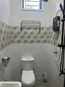 Koupelna v ubytování iDesa Homestay + 19 fotografií