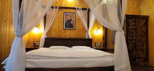 Letto o letti in una camera di Captain's Camp