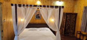 Letto o letti in una camera di Captain's Camp