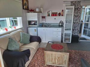 Kuchyň nebo kuchyňský kout v ubytování The Cosy Nook