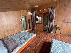 Postel nebo postele na pokoji v ubytování Chang's home