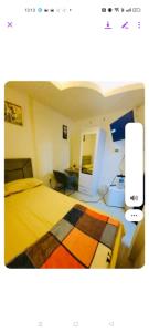 a picture of a bedroom with a bed and a desk at Room , Partition room , Partition , Master room in Dubai