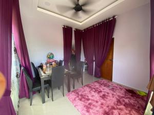 Кровать или кровати в номере mini homestay jasa rajin