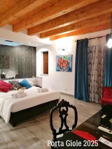 Postel nebo postele na pokoji v ubytování Casa Busari