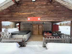 Ramsjö Camping Stuga v zimě