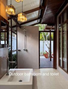 Ein Badezimmer in der Unterkunft Green Papaya Beach Resort, Koh Phangan