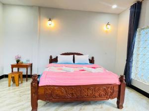 Postel nebo postele na pokoji v ubytování Golden Lady Hostel