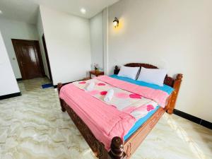 Postel nebo postele na pokoji v ubytování Golden Lady Hostel