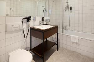 Um banheiro em Trip Inn Hotel Messe Westend