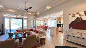 a living room with a couch and a table at Double Eagle in Rancho Mirage