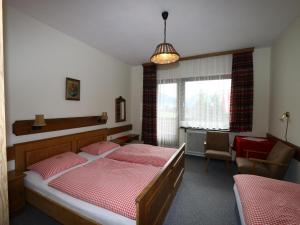 Ένα ή περισσότερα κρεβάτια σε δωμάτιο στο Apartment in Vorberg near Dachstein Glacier