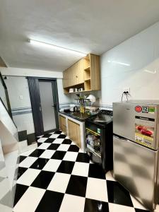 Η κουζίνα ή μικρή κουζίνα στο Can Tho Home & Apartment 3