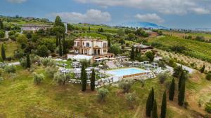 an aerial view of a villa with a swimming pool at Agriturismo Le Bosche in San Marino