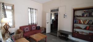 Posezení v ubytování Madhav Bhavan Guest House