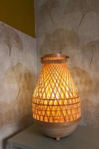 a large orange vase sitting on top of a table at casa dolce casa new in Rome +38 photos