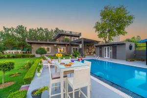 Fotografie z fotogalerie ubytování bloom haven v destinaci Faridabad