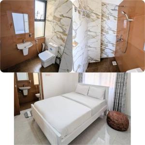 a bathroom with a bed and a toilet and a sink at Feel at Home in Kampala