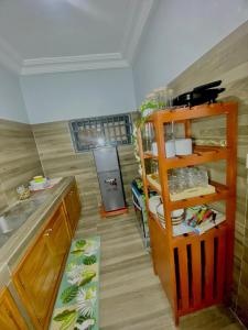 Η κουζίνα ή μικρή κουζίνα στο Residence Les Orchidées Cotonou