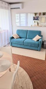 Posezení v ubytování Studio Belles Plages 1 ère ligne climatisé + 11 fotografií