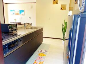 Cucina o angolo cottura di 千鳥3号天然温泉付別荘