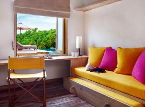 Posezení v ubytování Six Senses Laamu