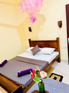 Giường trong phòng chung tại Sun land Villa