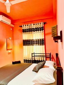 Giường trong phòng chung tại Sun land Villa