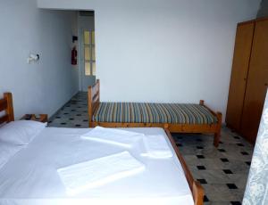 Postel nebo postele na pokoji v ubytování Manthos Sea View