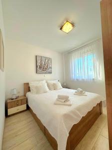 Posteľ alebo postele v izbe v ubytovaní Apartment Mišić